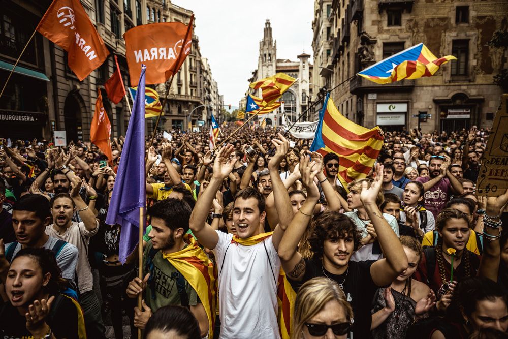 October 3, 2017 - Barcelona, Catalonia, Spain - Thousands of Catalan pro-independence activists shout slogans as they march through Barcelona during a general strike in defense of rights and freedoms after police violence during the secession referendum at October 1st. Spain's Central Government denies that there have been a referendum and does not accept the result as the Catalan referendum law had been suspended by Spain's constitutional court