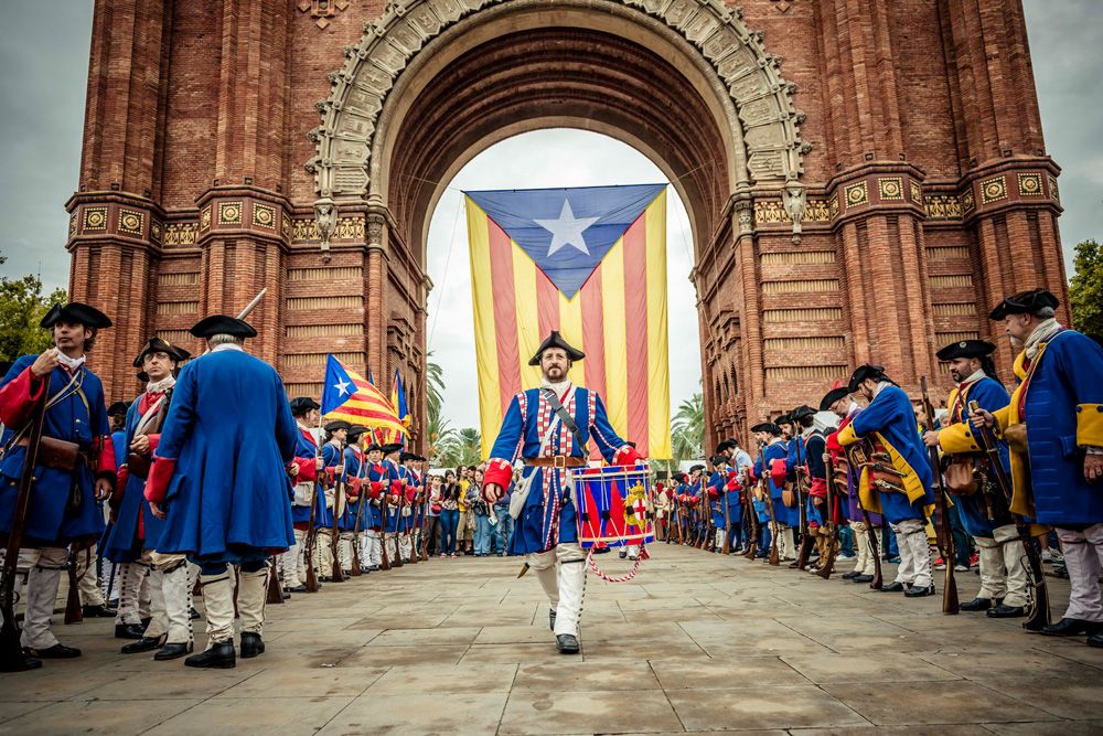 The 'Miquelets de Catalunya' (irregular Catalan and Valencian mountain light troops in the 17th and 18th centuries) march in their traditional uniforms through the city of Barcelona on the 'Diada' 2015, Catalonia's national day