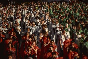 Barcelona, Spain. 20 April, 2024: 
Protesters against Israel's ongoing attacks on the Gaza Strip, which have led to numerous civilian deaths, form a large human mosaic representing the Palestinian flag. Israles attacks are a reacting to an attack by the Islamist organization Hamas on 7 October.