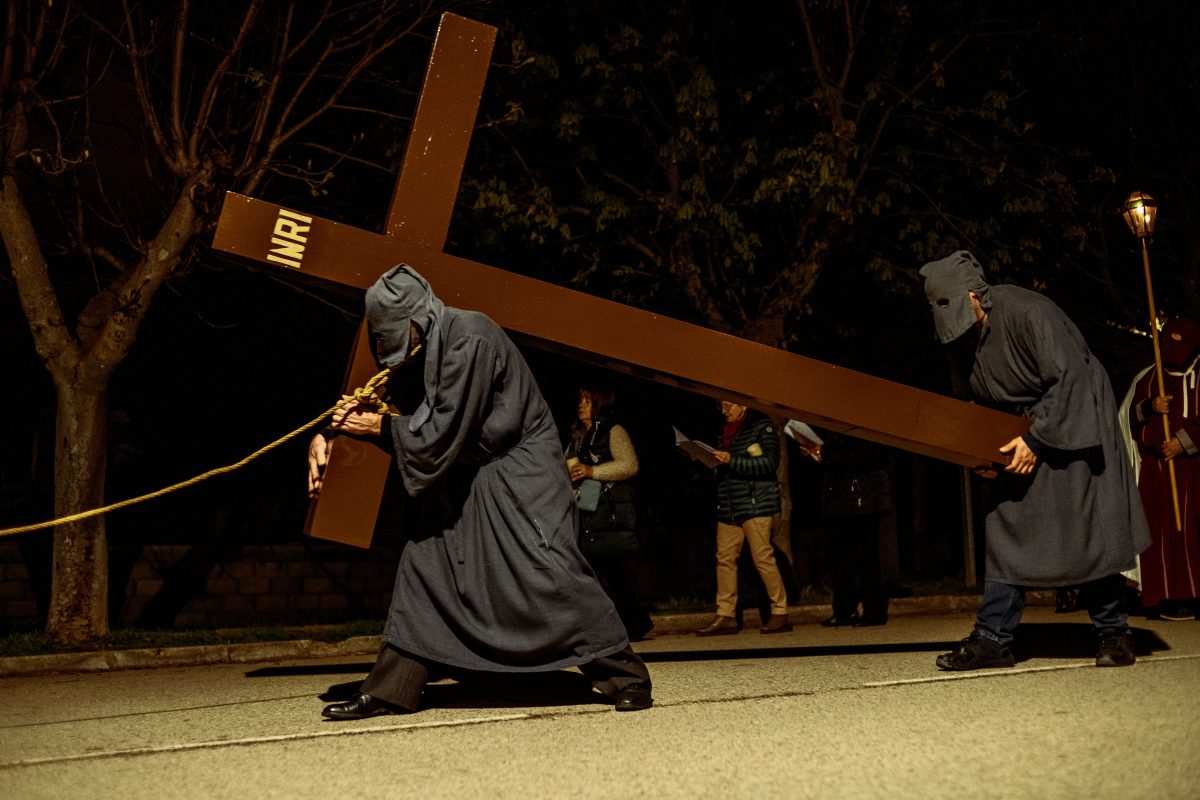 Masked penitents brotherhood take part in the 'Ensogado' procession at Maundy Thursday