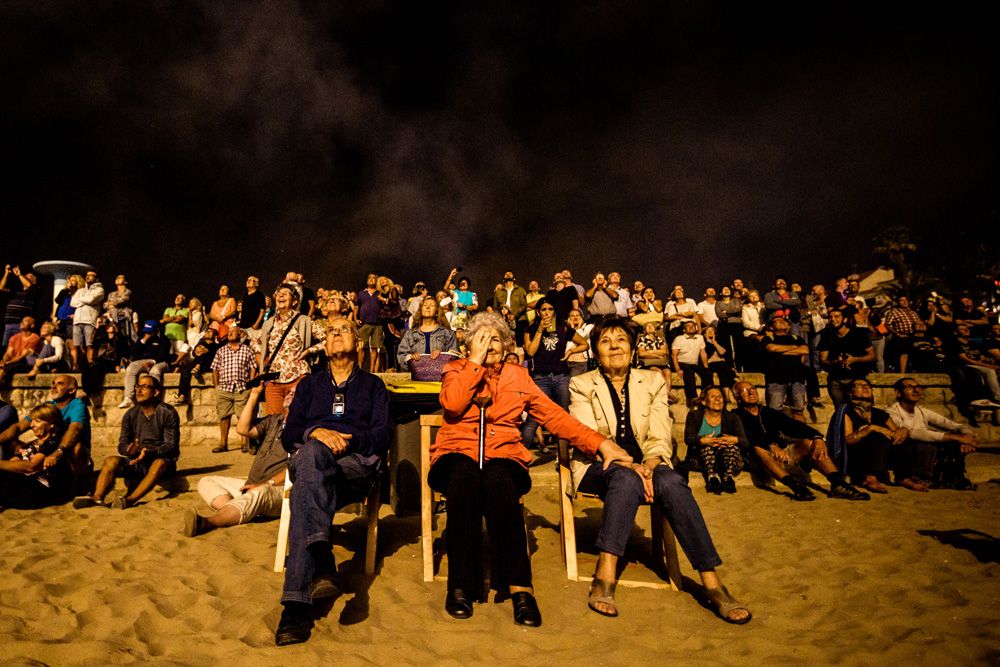 Sitges, Spain. 22 September, 2016: Thousands follow the traditional display of fireworks at the 'San Bartolome' church taking place during the 'Santa Tacla Festival' in Sitges.