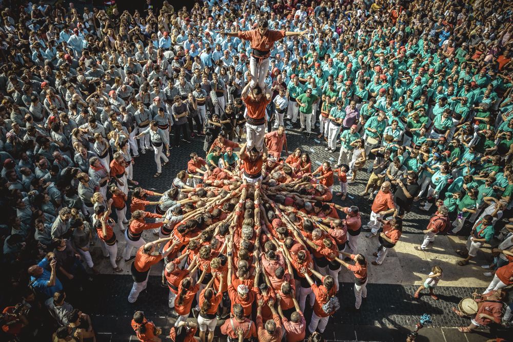 Barcelona, Spain. 24 September, 2016: The 'Castellers de Barcelona' build the base of a human tower during Barcelona's city holiday 'La Merce'