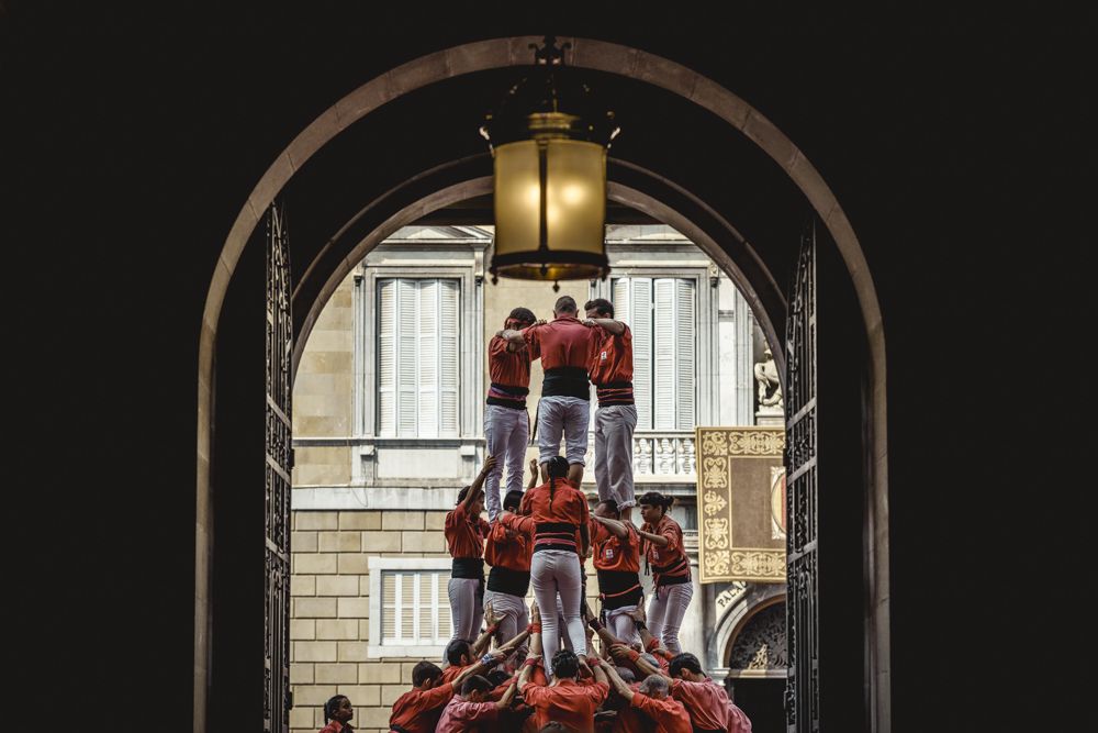 Barcelona, Spain. 23 September, 2017: The 'Castellers de Barcelona' build the base of a human tower during Barcelona's city holiday 'La Merce'