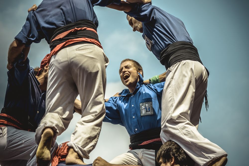 June 8th, 2014. Barcelona, Spain: The Castellers de la vila de Gracia build a human tower, '5 de  8' in the second round of the Castellers day in front of the 'Sagrada Familia'