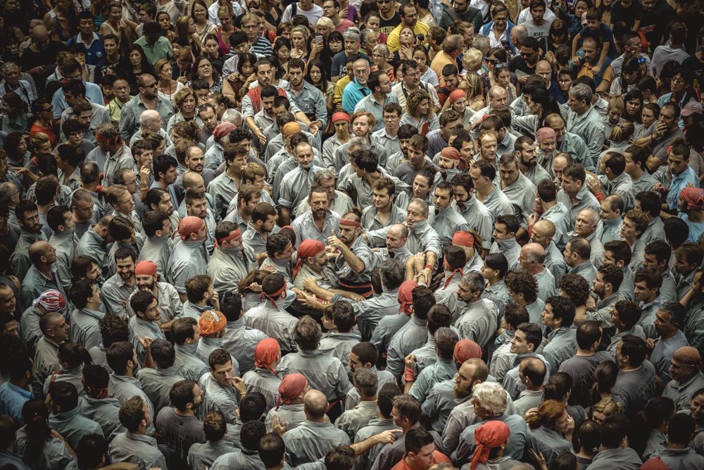Barcelona, Spain. 24 September, 2016: The 'Castellers de Sants' organize the base of a human tower during Barcelona's city holiday 'La Merce'